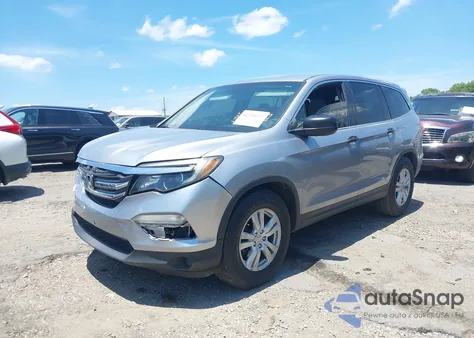 2018 Honda Pilot Lx z USA, uszkodzony, nr VIN 5FNYF5H10JB001132